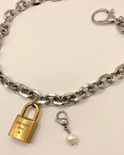 Repurposed LV lock and pearl necklace