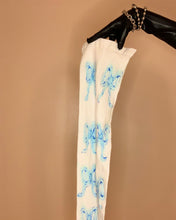 Recycled ghost bow drip tights