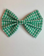 Embellished bow barrettes