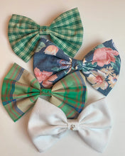 Embellished bow barrettes