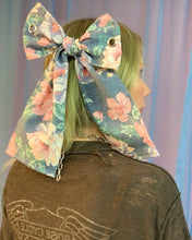 Grommet bow barrette