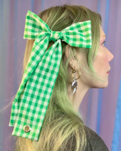 Grommet bow barrette