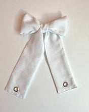 Grommet bow barrette