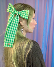 Grommet bow barrette