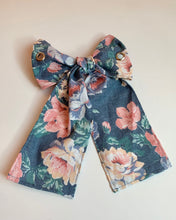 Grommet bow barrette