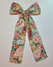 Grommet bow barrette