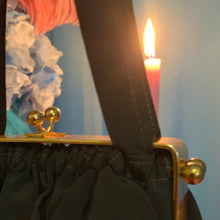 Bolso de mano de latón Faille