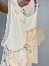 Camiseta sin mangas de canalé con volantes