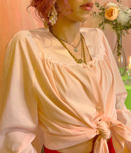 Top de pijama color melocotón pastel