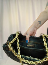 Bolso de mano de paja tejida MCM de los años 60