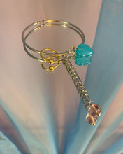 Pendiente único con corazón perforado