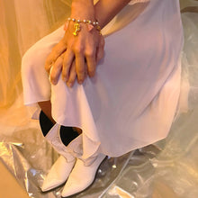 Vestido escotado de encaje transparente