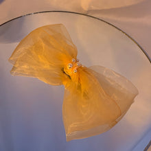 Large pearl bow barrette