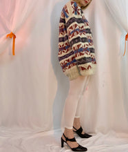 Tacones asimétricos con tiras y botones