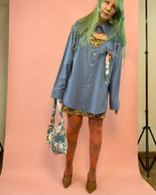 Botón con recorte de corazón hacia abajo