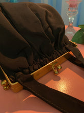 Bolso de mano de latón Faille