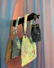 Handmade pierced denim pouch bag