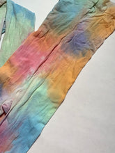 Recycled watercolor rainbow drip tights