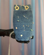 Handmade pierced denim pouch bag