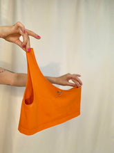 One shoulder pierced tank