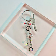 Pendiente individual con llave perforada