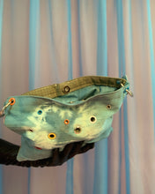 Handmade puff grommet bag