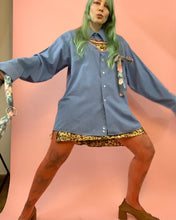 Botón con recorte de corazón hacia abajo