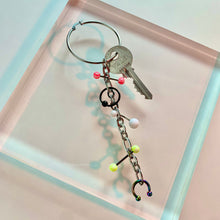 Pendiente individual con llave perforada