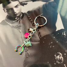 Pendiente individual de concha perforada