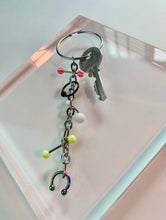 Pendiente individual con llave perforada