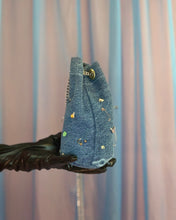 Handmade pierced denim pouch bag