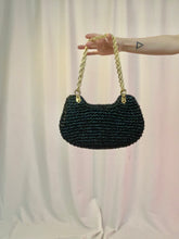 Bolso de mano de paja tejida MCM de los años 60