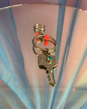 Pendiente individual con llave perforada