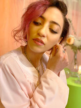 Top de pijama color melocotón pastel