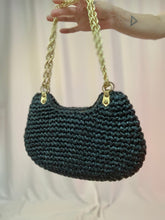 Bolso de mano de paja tejida MCM de los años 60