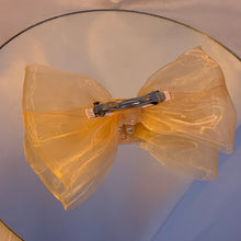Large pearl bow barrette