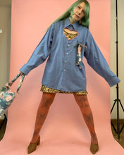 Botón con recorte de corazón hacia abajo