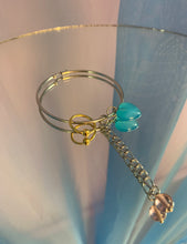 Pendiente único con corazón perforado