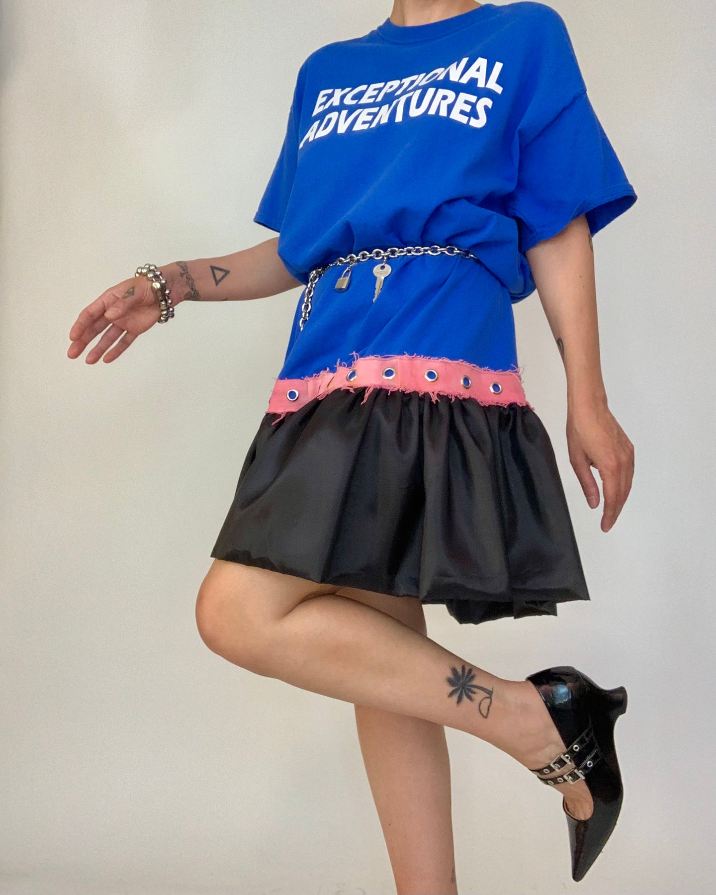 Upcycled grommet belt bubble dress