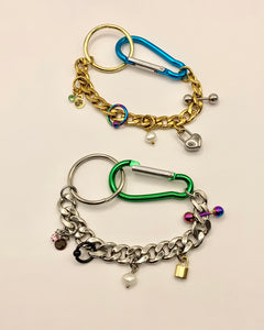 Pierced charm carabiner bracelet