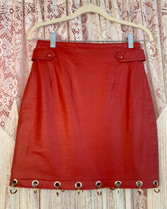 Upcycled grommet ring leather skirt sample