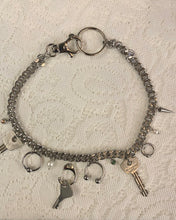 key charm pierced necklace