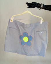 Upcycled vinyl daisy patch skirt