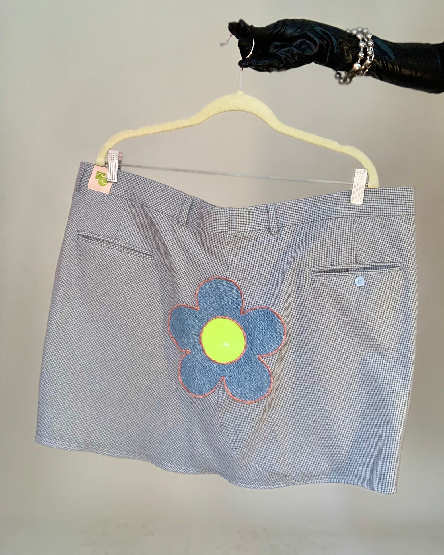 Upcycled vinyl daisy patch skirt