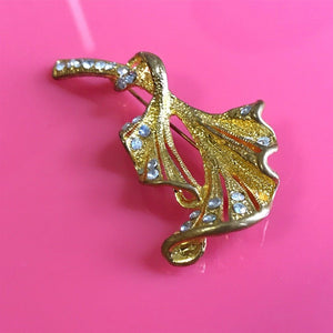 Gold flower with rhinestone detail