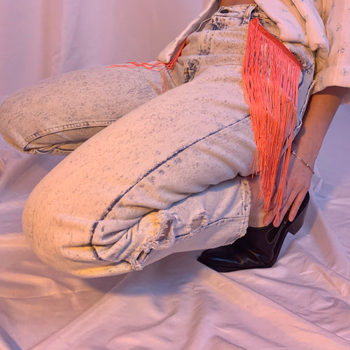 Acid wash fringe jeans