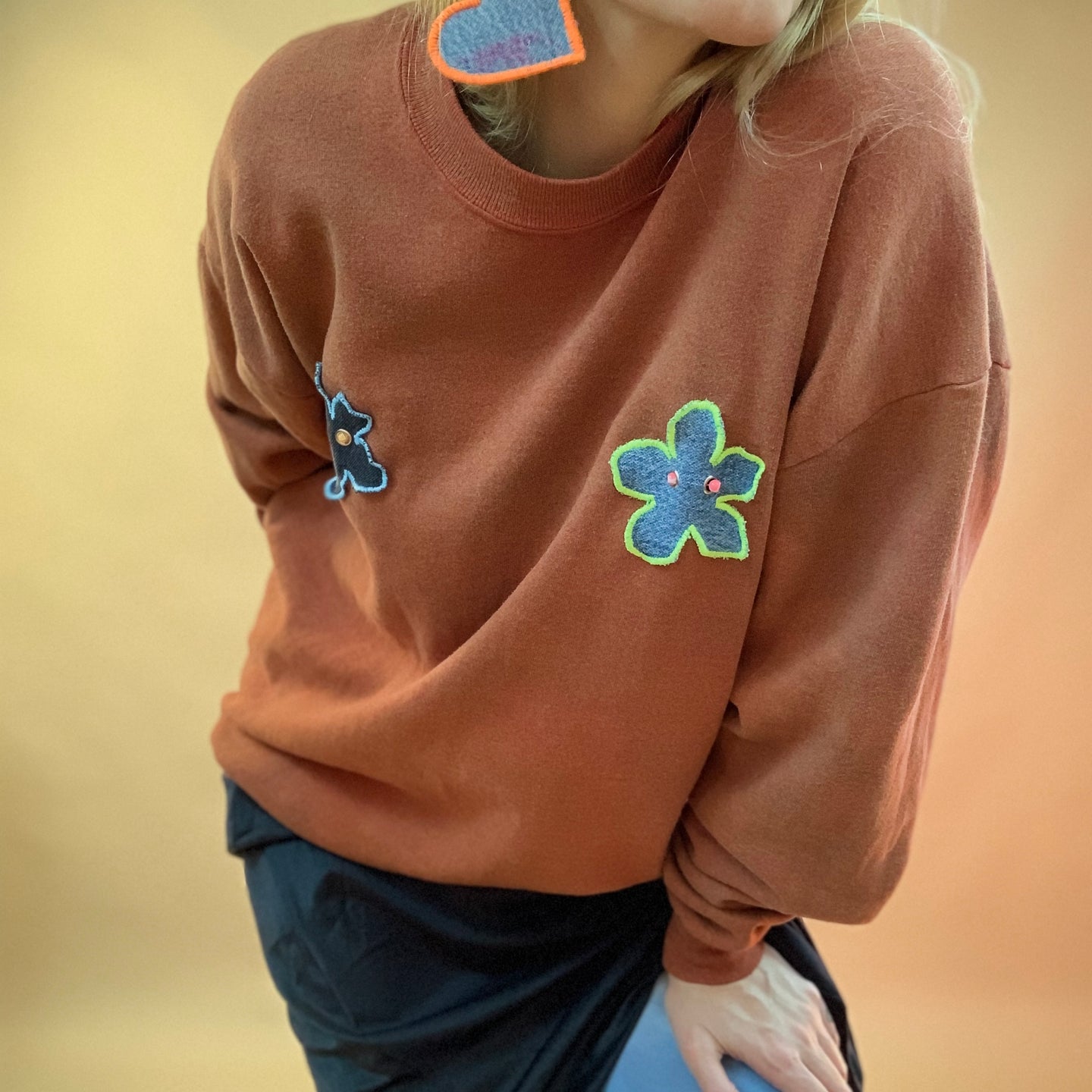 Upcycled pierced flower sweatshirt