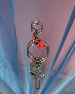 Pierced key single earring